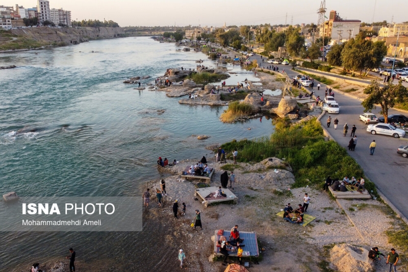 تصاویر/ مسافران نوروزی در کنار رودخانه دز-دزفول