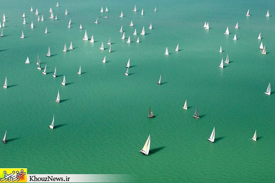 SETTING SAIL: Competitors sailed after the start of the three-day Blue Ribbon yachting race around Lake Balaton in Hungary on Thursday. This year, around 570 sailboats started the largest round-the-lake yachting race of Europe. (Gabor Turcsi/European Pressphoto Agency)