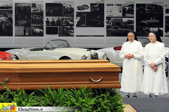 FERRARI FUNERAL: Two nuns paid their respects at the coffin of Sergio Pininfarina inside a plant in Cambiano, Turin, Italy, Thursday. Mr. Pininfarina, a former Ferrari car designer whose family company designed almost every Ferrari since the 1950s, died at the age of 85. (Alessandro Di Marco/European Pressphoto Agency)
